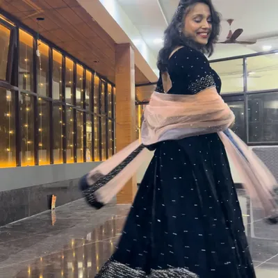 Twirling into the wedding season. A candid shot capturing the joy and movement of dancing at a family function.