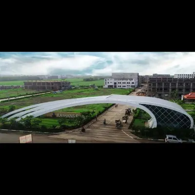 The entrance gate for the Rajhans Elysian township is designed as a modern, sculptural arch. Its sweeping form creates a memorable and futuristic sense of arrival for residents and visitors.