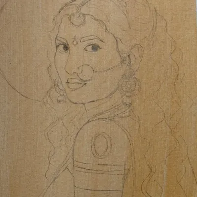The journey of my Maa Durga painting begins with a detailed pencil sketch on canvas. This foundational drawing maps out the composition, expression, and intricate details of her jewelry and crown before I apply any paint.