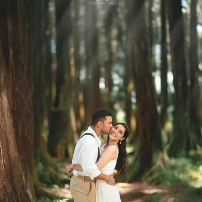 A sweet kiss on the cheek, filled with genuine laughter and affection. Capturing these spontaneous, happy moments is central to my approach, ensuring your pre-wedding photos reflect your true personalities.