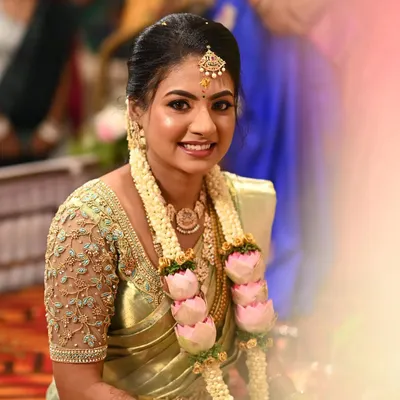 A happy, natural smile from my client on her ring ceremony day. The makeup is designed to enhance her features for a fresh and radiant look.