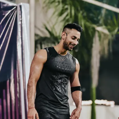 The reward for work well done is the opportunity to do more. A candid, smiling shot after a tough workout. Feeling grateful and ready for the next challenge.
