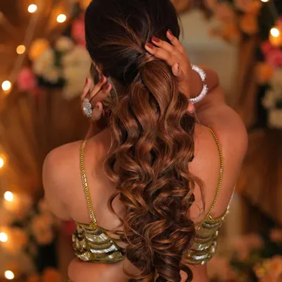 A fresh and peppy beach waves ponytail, perfect for a sangeet or cocktail look. We teach you how to create volume, texture, and hold for hairstyles that last all night long.