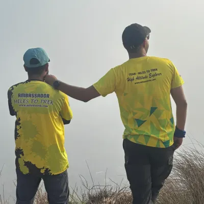 Our trek leaders looking out over the mountains. We are a team of passionate and certified professionals dedicated to providing safe and inspiring outdoor experiences.
