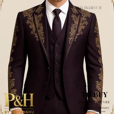 A close-up of my dark purple three-piece suit, showcasing the magnificent golden hand-embroidery that adorns the lapels and shoulders, creating a look of pure opulence.