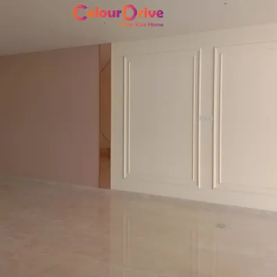 This image showcases our precision painting on MDF and solid wall beading. The clean lines and smooth finish on the mouldings create a polished and high-end look, complementing the freshly painted walls.