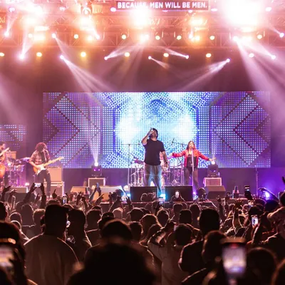 A wide view from the stage during a Farhan Live concert. Seeing a sea of people connected by music is the ultimate reward for any performer.