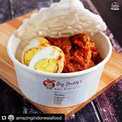 Our Nasi Bali Daging Pedas, a spicy Balinese rice bowl that's a huge hit. It's packed with flavor, with spicy meat and a hard-boiled egg, all in one easy-to-carry bowl.
