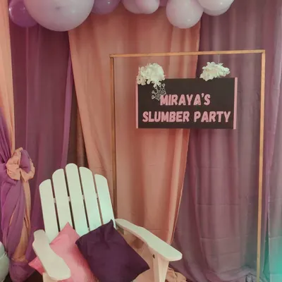 A cozy corner at Miraya's slumber party. I create dedicated photo spots with comfortable seating and a personalized sign, perfect for capturing memories of the special night.