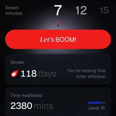 This is a screenshot from my own practice, showing a 118-day meditation streak on the Miracle of Mind app. The app's tracker is a great motivator, and seeing the minutes add up reinforces my commitment to inner stillness.