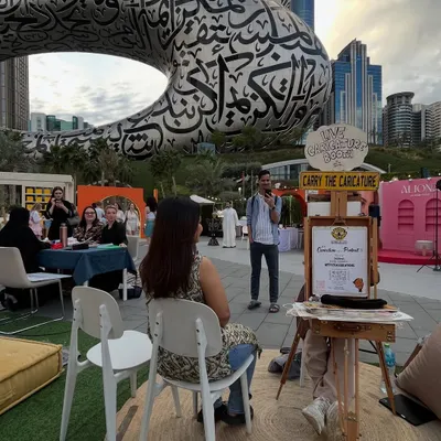 My office view in Dubai, with the stunning Museum of the Future in the background. What an incredible place to be creating art.