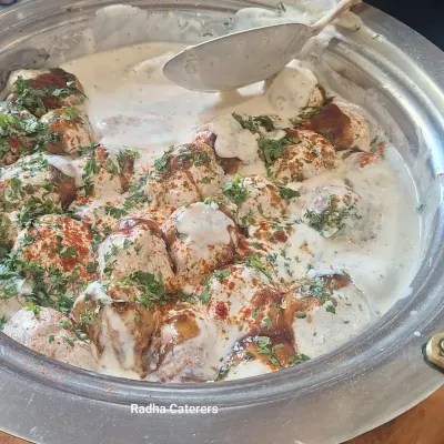 Our Dahi Vada is the perfect balance of sweet, savory, and tangy. It's a light yet satisfying starter for any party.