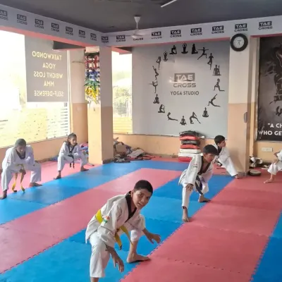 Mastering the basics is essential. Our young students practice their foundational stances, building the stability and power needed for all Taekwondo movements.