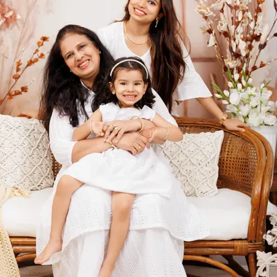 Three generations of love. This beautiful portrait of a grandmother, mother, and daughter in our bohemian setup is a timeless keepsake.