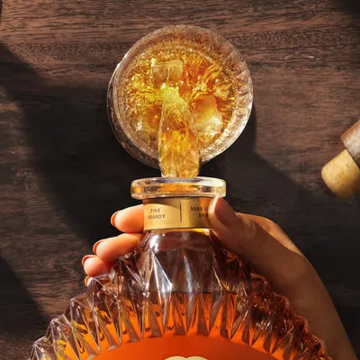 Who knew pouring a drink could be so difficult at work? This top-down shot for Monarch Brandy was a concept I always wanted to execute, capturing the dynamic splash and rich color of the liquid from a unique perspective.