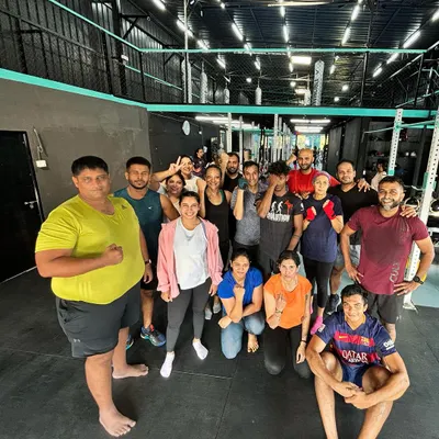 The team after a tough session. This group photo captures the camaraderie and positive energy of our community. We come from all walks of life but share a common goal of getting better every day.