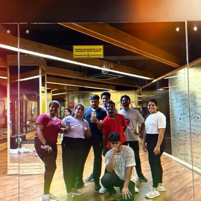 A happy group photo after a challenging but fun dance fitness class. The smiles and sweat show a workout well done.