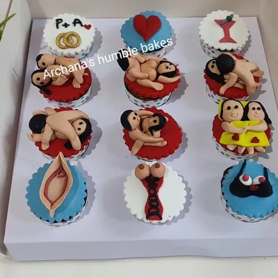 A box of my custom naughty cupcakes, perfect for a bachelorette party or a fun, cheeky gift. These are all handcrafted with fondant to create playful and adult-themed designs.
