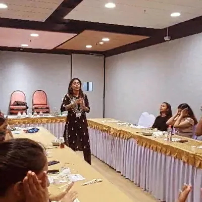 Leading a unique corporate wellness session on Face Yoga and the power of natural ingredients for healthy, glowing skin.