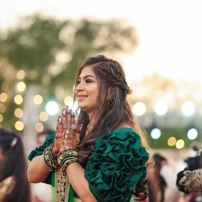 A beautiful candid of a wedding guest. I gave her a soft, natural glam look with a simple half-up hairstyle that was perfect for the daytime ceremony.