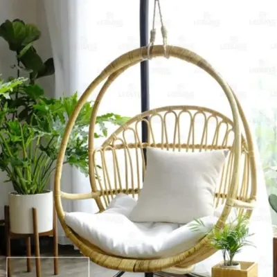 Our popular rattan swing chair is the ultimate piece for balcony relaxation. It's handcrafted to be both strong and beautiful, providing a perfect spot to enjoy a cup of tea and a good book.
