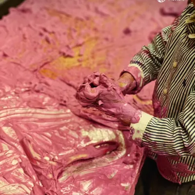 A child's hands deep in a mountain of pink foam is a full-body sensory experience. The unique texture and vibrant color invite exploration, supporting language development and emotional expression in a joyful, open-ended way.