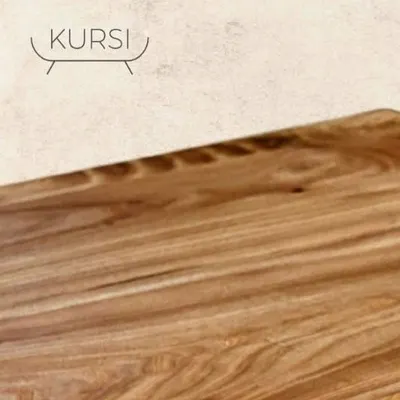 The beginning of a beautiful dining space. This is a slab of live-edge teak, showcasing the natural, uncut edge and the stunning grain of the wood before it's crafted into a tabletop.