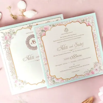 Romance in every detail. This pastel floral wedding invitation uses soft hues and timeless elegance, with delicate roses and luxe gold foiling setting the perfect tone for your special day.
