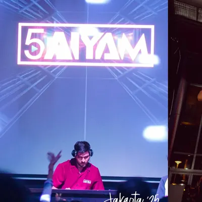 On stage in Jakarta with my name on the big screen behind me. This was a proud moment, playing for a huge international crowd and representing the Indian music scene.