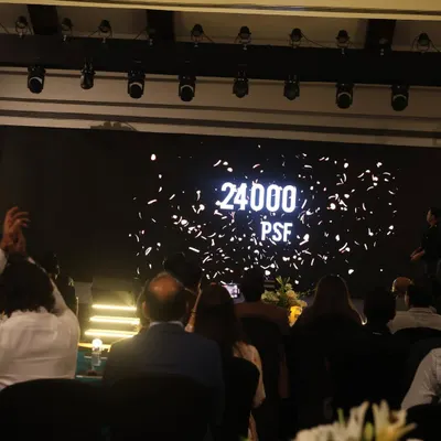The final reveal for Great Value Realty, where a number guessed by the audience magically appears on the screen. This kind of interactive reveal makes the moment feel personal and amazing.