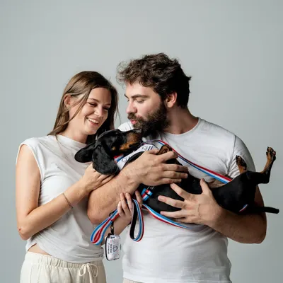 There is nothing more heartwarming than capturing a family's love for their pet. This photo, featuring a couple and their dachshund, is filled with so much affection. It’s a perfect example of pet product lifestyle photography that feels real and unposed.