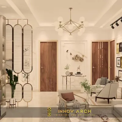A render of a living room designed in a modern and contemporary theme for a residence in Rajnagar Extension. This view showcases the open layout, with a stylish partition separating the seating area from the entrance, creating a sense of arrival.