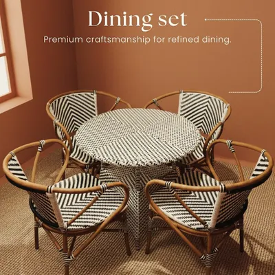 This is our premium black-and-white wicker dining set, perfect for refined outdoor dining. The set includes four ergonomically designed chairs and a matching round table, all showcasing our commitment to premium craftsmanship.
