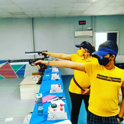 Two of our young members practicing their air pistol form. This discipline requires a one handed stance, which is a unique challenge of balance and control.
