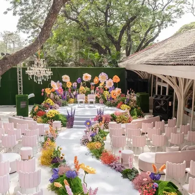 **Whimsical & Vibrant:** A fairytale brought to life with cascading florals, lush garden settings, and elegant details. The "Bloom" wedding decor turns dreams into a breathtaking floral paradise.