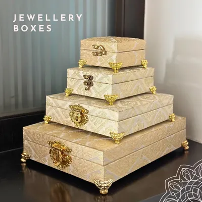 A stunning stack of my cream and gold brocade jewelry boxes. Available in four nesting sizes, they feature ornate clasps and feet, making them a beautiful and practical addition to any dressing table.