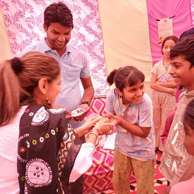 I believe in giving back to the community. This image is from an event where I, as President of the NGO Yuva Awaz Samaj Ki Shakti, celebrated Maharishi Valmiki Jayanti with local women and children. It was a wonderful day of connection and inspiration.