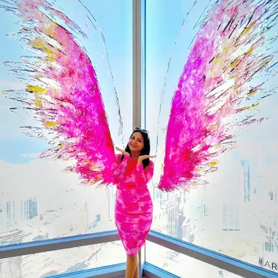 Feeling like an angel with these beautiful wings at the Sky Views Dubai. This pink tie-dye dress from Myntra was the perfect vibrant outfit for a day of sightseeing in Dubai.