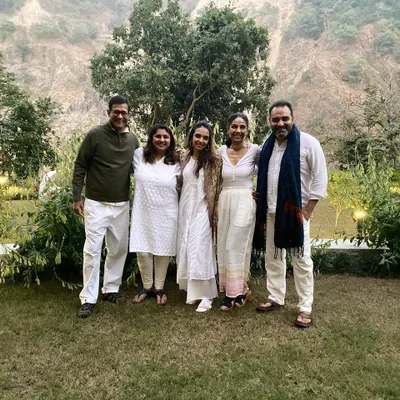 A small group photo in the beautiful gardens of our retreat center. The connections formed here are deep and lasting, creating a supportive tribe of fellow seekers.