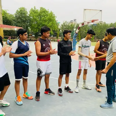 Congratulating players on their effort and sportsmanship after a well-played match.
