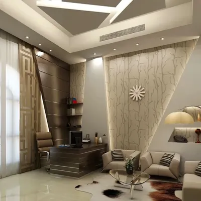 This executive office design combines comfort and professionalism, featuring a dedicated seating area for informal meetings. We used geometric patterns, a mix of textures, and a multi-level ceiling with recessed lighting to create a space that is both impressive and functional.