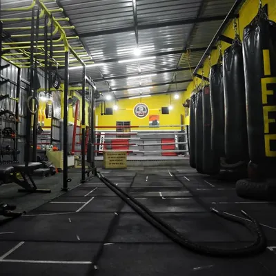This is our Kempapura facility, a space built for hard work and dedication. Every piece of equipment, from the boxing ring to the battle ropes, is here to help you forge yourself into a warrior.