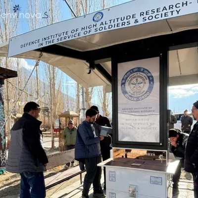 Our team and visitors gather around the newly installed Smart Solar Hut at DIHAR, DRDO, in Leh. This unit is equipped with special features like blood pressure and body temperature monitoring to serve the health needs of personnel in high-altitude environments.