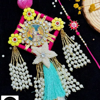 Celebrate your unique bond with this handcrafted paired rakhi set. Featuring a beautiful Radha Krishna lumba for Bhabhi and a matching rakhi for Bhai, it's a perfect symbol of your connected relationship.