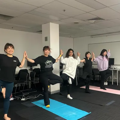 Leading a group of students in Vrikshasana, or tree pose, at Gamma College in Melbourne. It was a joy to introduce yoga to these wonderful students.