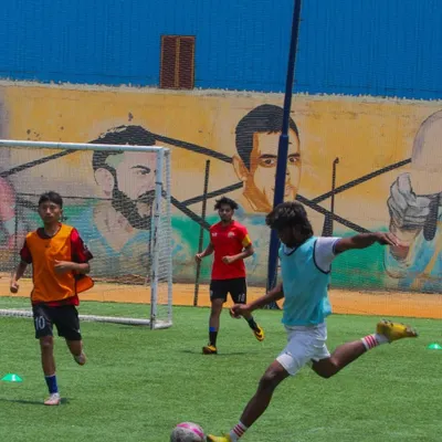 A player unleashes a powerful shot on goal during a shooting drill. We focus on technique to improve accuracy and power.