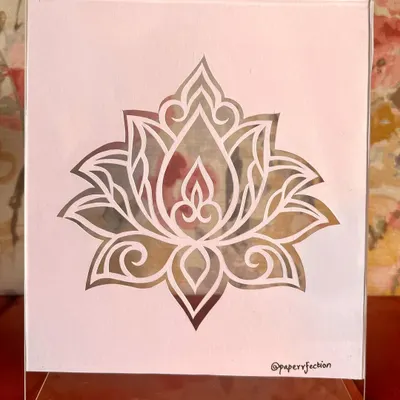 Here is my finished lotus design, all framed and ready to go. I chose a clear acrylic frame for this one because it gives the paper-cut a beautiful floating effect. The lotus is such a peaceful and symmetrical symbol to work on.