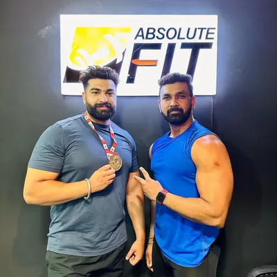 Meet Ranjodh, our Sheru Classic Powerlifting Champion. He represents the strength and determination we foster at Absolute Fit, bringing home the gold and showing what's possible with dedication.