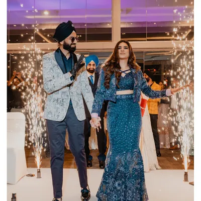 Making a grand entrance with sparklers lighting the way. We love capturing the high-energy start to a memorable cocktail night.