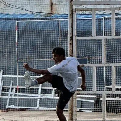 A shot of me in action during our community football tournament. It's all about bringing people together, staying active, and enjoying the sport.
